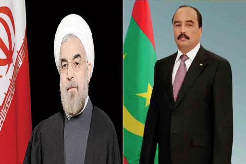 الرئيسان الموريتاني محمد ولد عبد العزيز والإيراني حسن روحاني.