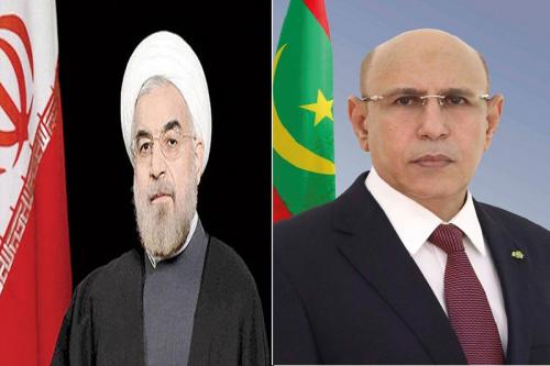 الرئيس الموريتاني محمد ولد الشيخ الغزواني ونظيره الإيراني حسن روحاني