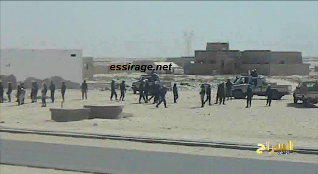 سيارات الحرس قاموا بالتمركز قرب الطريق الرسمي