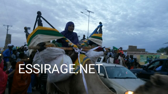 سيدة على جمل خلال الاحتفال اليوم