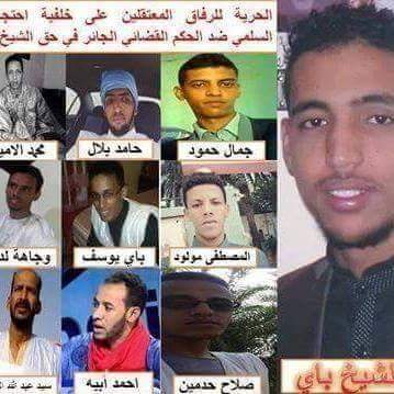 صورة من بعض النشطاء إلى جانب الشيخ باي