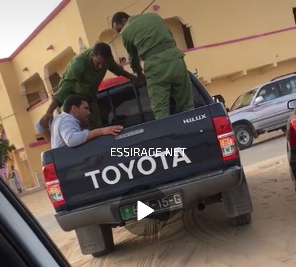 لحظة إيقاف المصور 